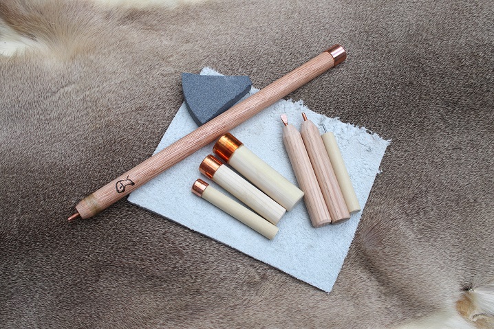 Flint knapping kit and shell bracelet.